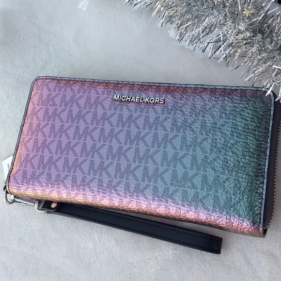Michael Kors Handbags - Sold Rare Michael Kors Hologram Continental Wallet